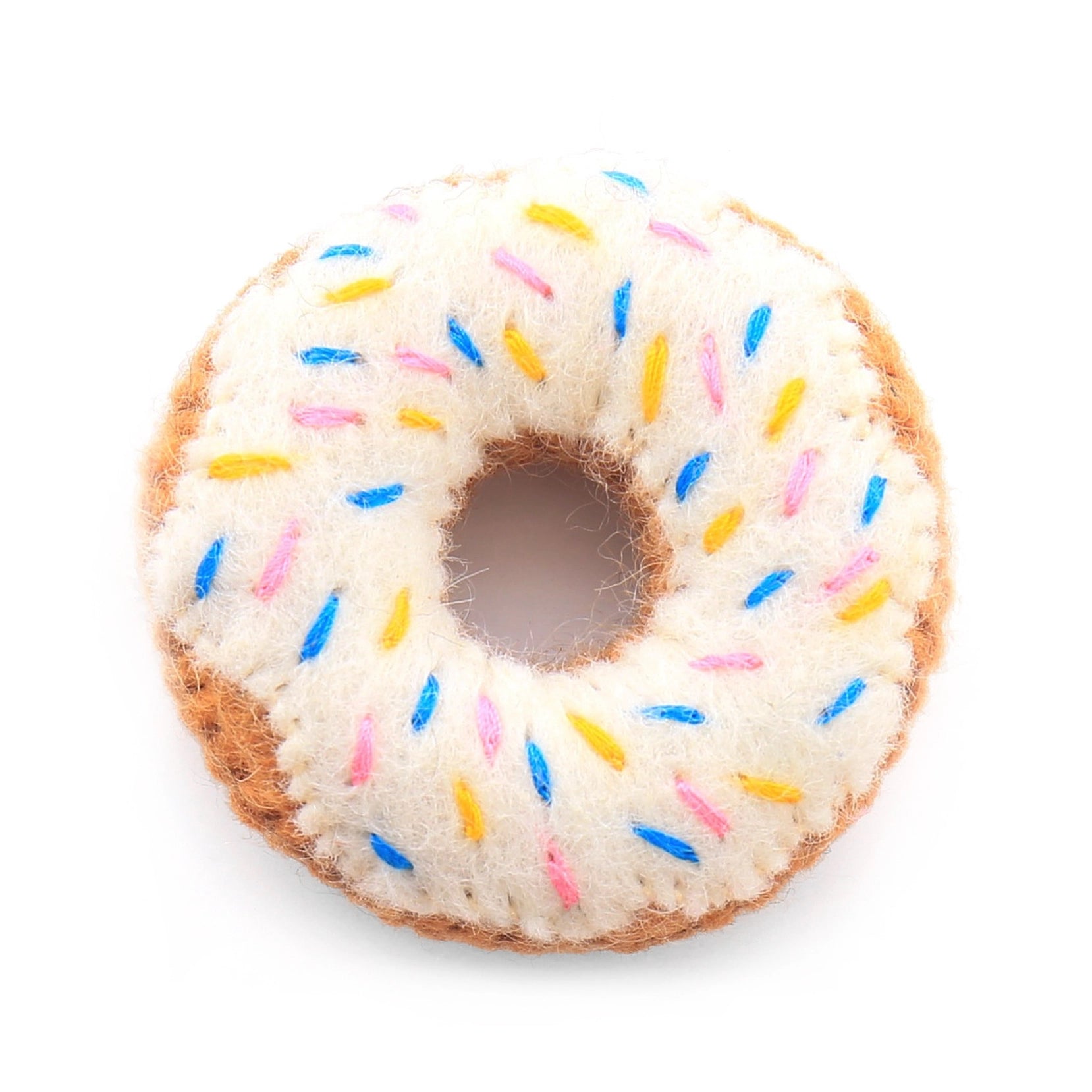 A wool donut toy with pink “frosting” and sprinkles, made with natural wool and organic catnip.