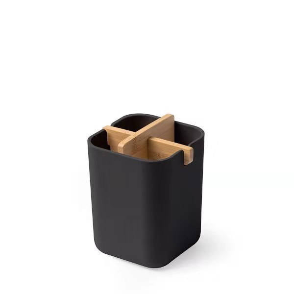 A rectangular matte black toothbrush holder with a cross-shaped bamboo divider. The holder is empty and displayed on a white background.