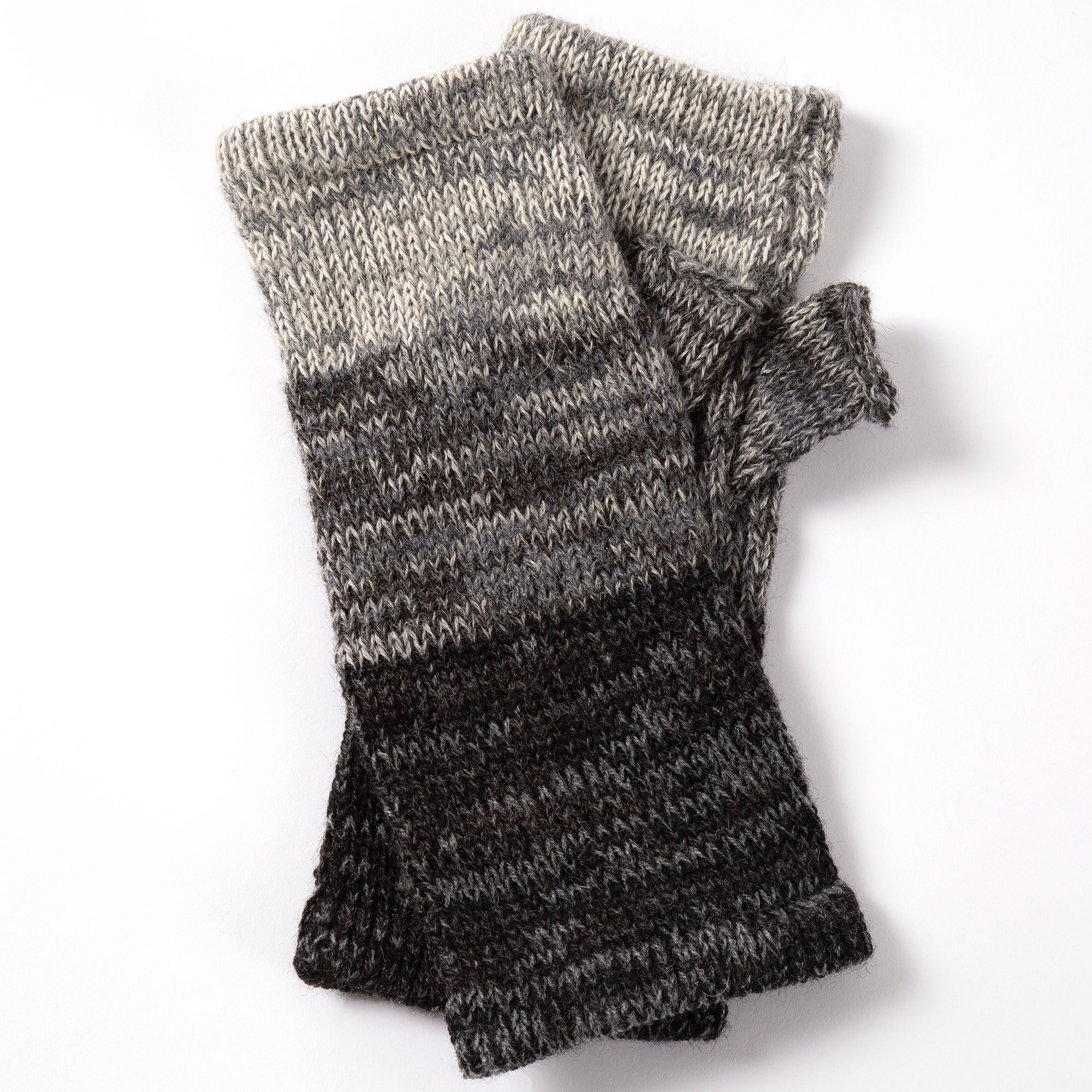 Grey and black alpaca fingerless mittens with a bold, geometric knit. Handmade and warm without added bulk