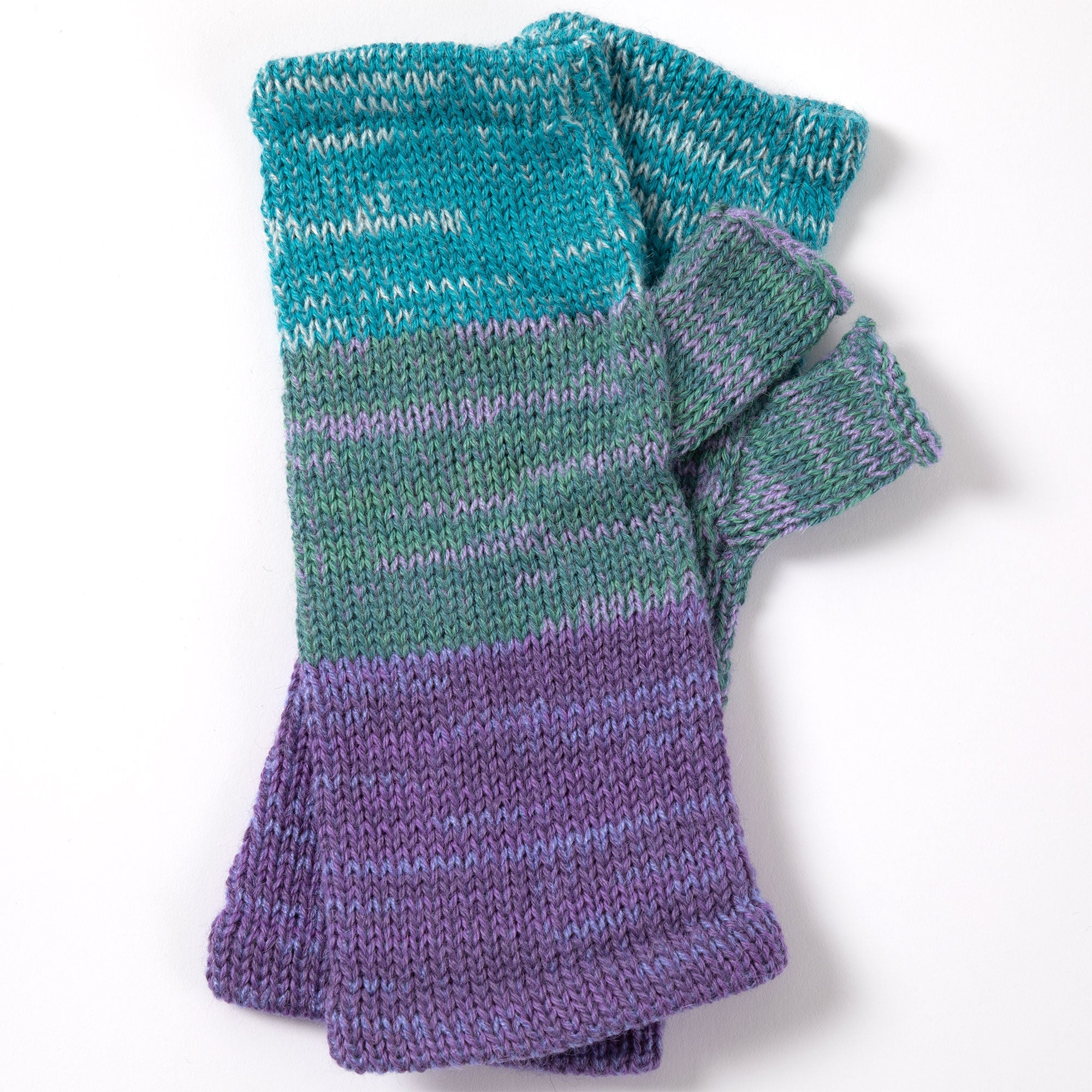 Blue, gray, and purple alpaca fingerless mittens laid flat to show the textured knit and rich color contrast. Handmade and wrinkle-resistant.