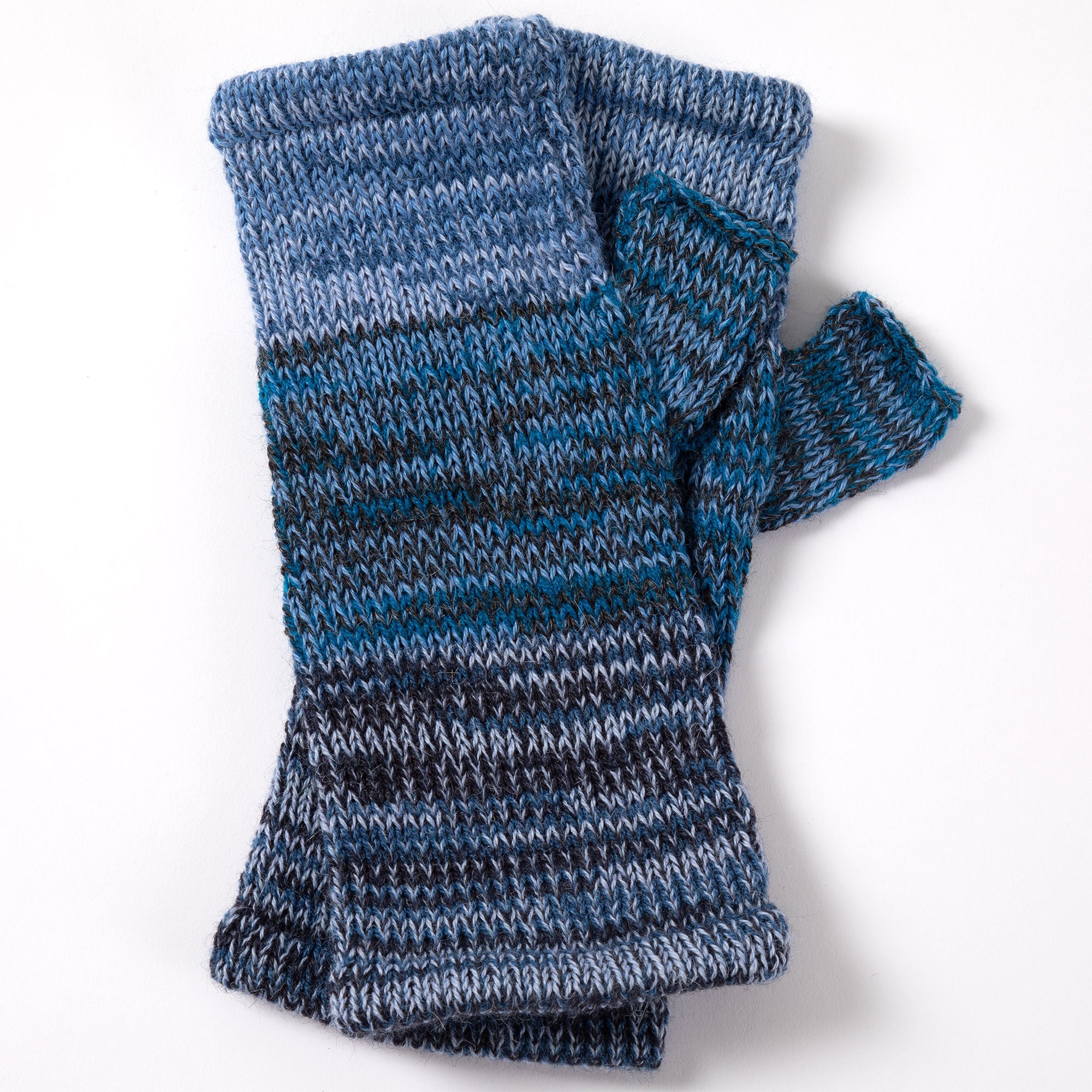 Pair of blue and black alpaca fingerless mittens, featuring a textured knit and subtle color contrast. Naturally warm and handmade.