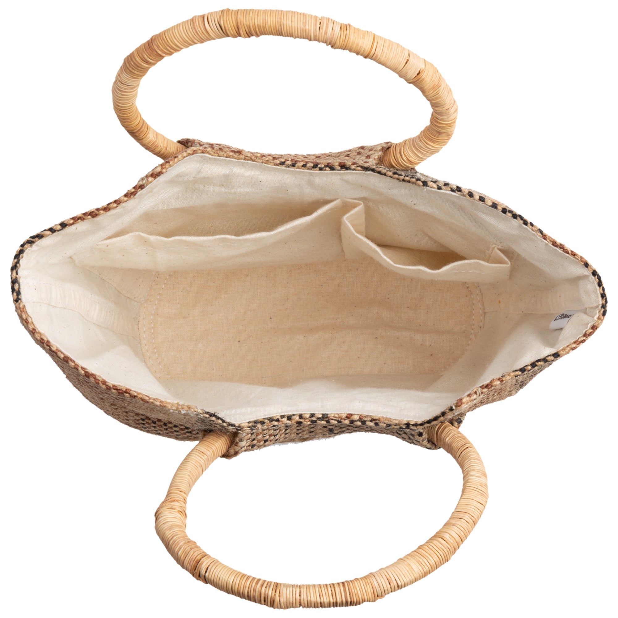 Top-down interior view of the palm fiber tote showing cotton lining, a zip pocket, and two open compartments. Combines practical storage with natural materials.