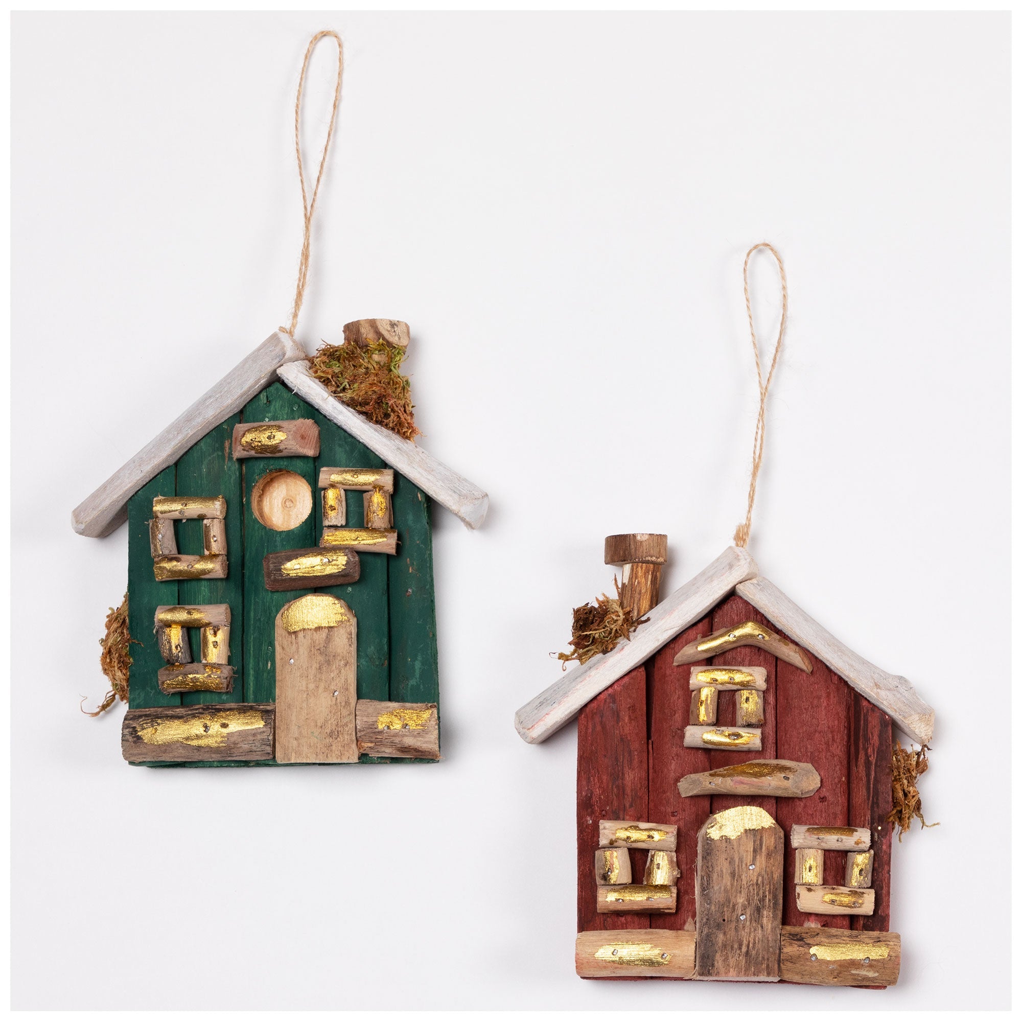 Pair of festive driftwood house ornaments in green and burgundy paint. Handmade from recycled wood, supporting artisan livelihoods and fair-trade practices.