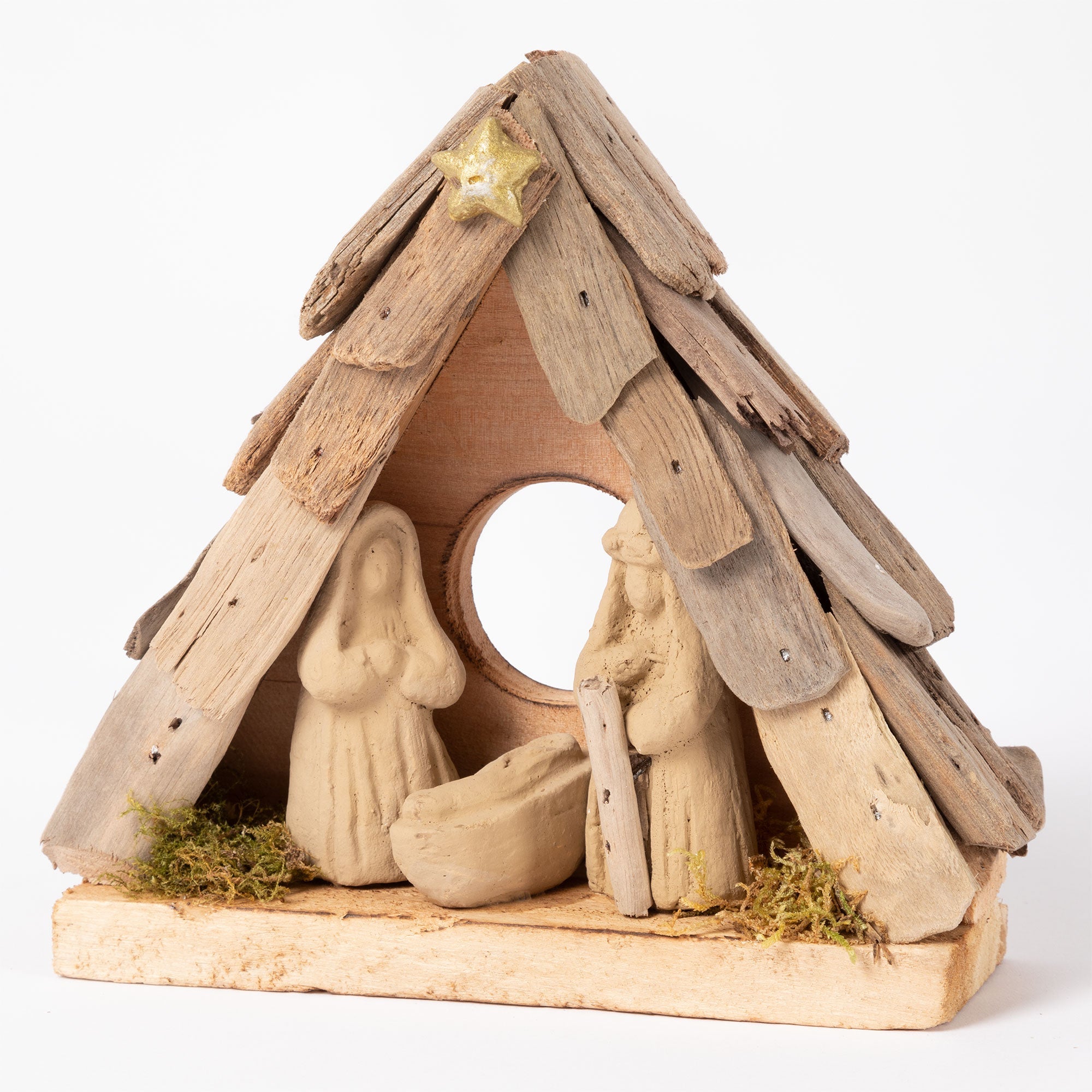 Handmade recycled driftwood star nativity ornament with clay figures of Joseph, Mary, and baby Jesus, designed for eco-friendly holiday decor.