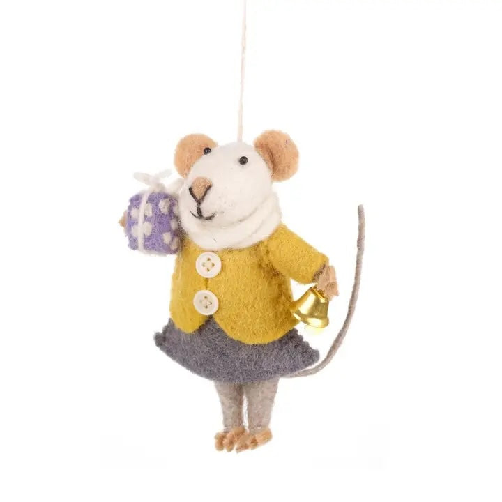 A handmade felt mouse is shown, wearing a yellow jacket and gray skirt with a white scarf. It is holding a purple gift box and a small golden bell.