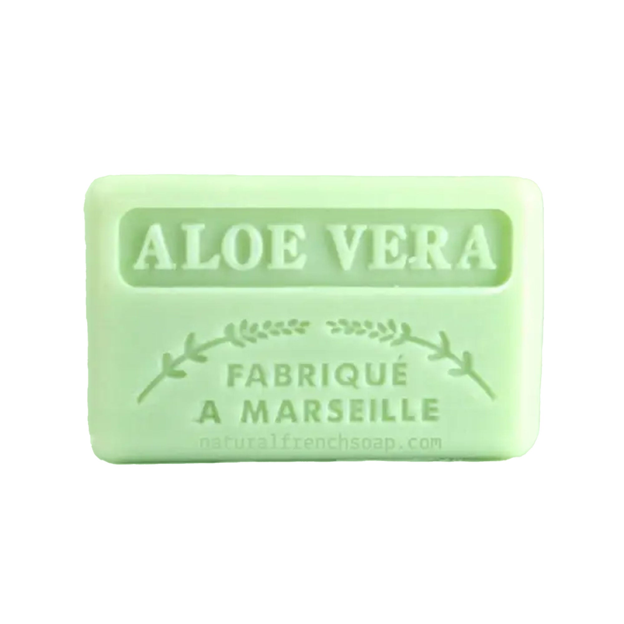 Green bar of soap with 'Aloe Vera' and 'Fabrique a Marseille' text on a white background