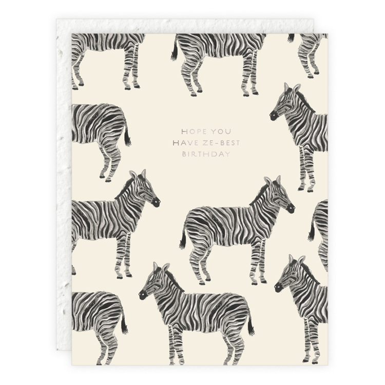A seedling card featuring a repeating pattern of zebras on a cream background with text in the center that reads: "Hope you have ze-best birthday."