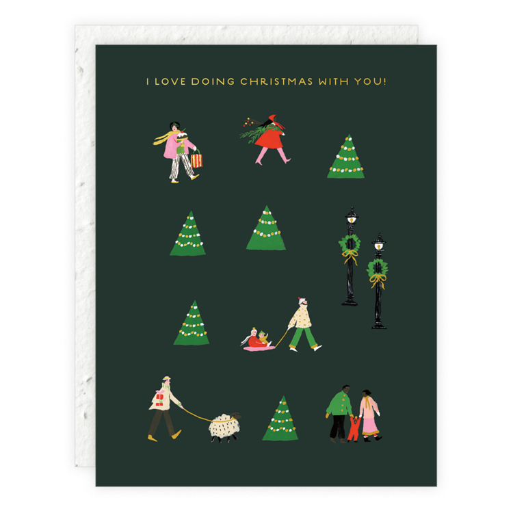A dark green holiday card featuring small illustrations of people walking, carrying gifts, trees decorated with lights, a dog, street lamps, and a family holding hands. Text reads: "I love doing Christmas with you!"