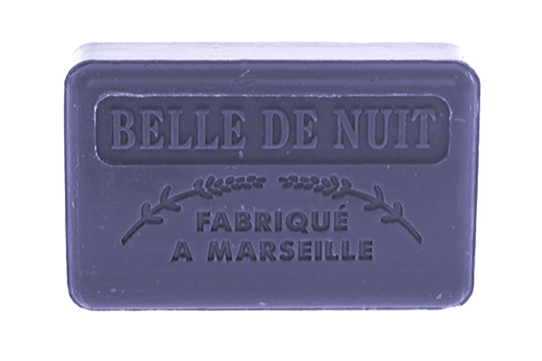 A dark purple French soap bar with embossed text reading "Belle de Nuit" and "Fabriqué a Marseille".
