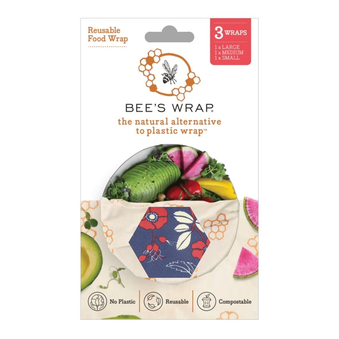 Packaging for Bee’s Wrap reusable food wraps showing a hexagonal window with a blue and red floral pattern and fresh vegetables inside the wrap.