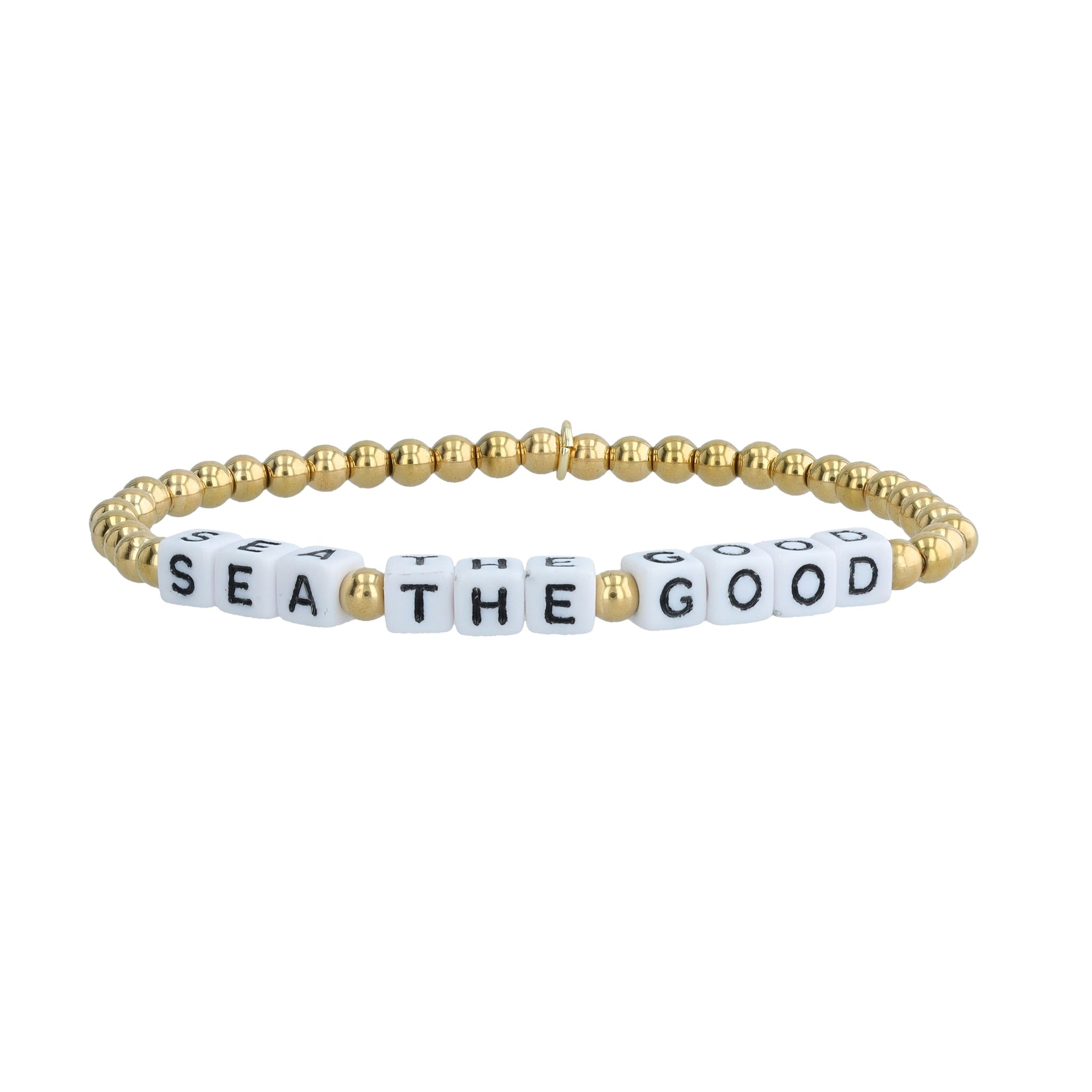 Recycled bracelet with gold-plated beads and colorful “Sea The Good” letters. Water-resistant, eco-conscious accessory handmade in Bali.