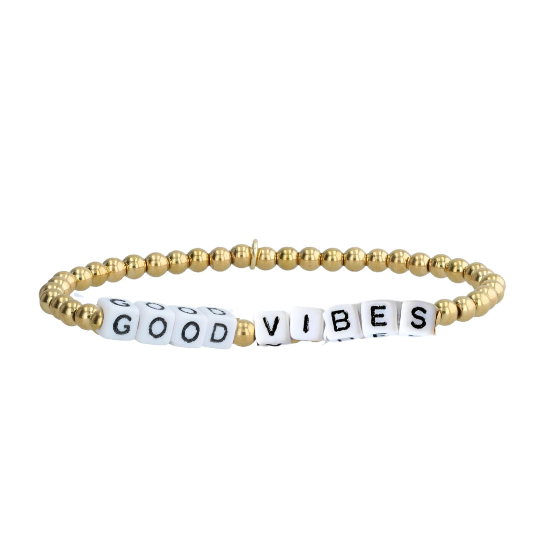 “Good Vibes” word bracelet featuring 14K gold-plated and recycled plastic beads. Eco-conscious, durable, water-safe, and handmade in Bali by artisans.