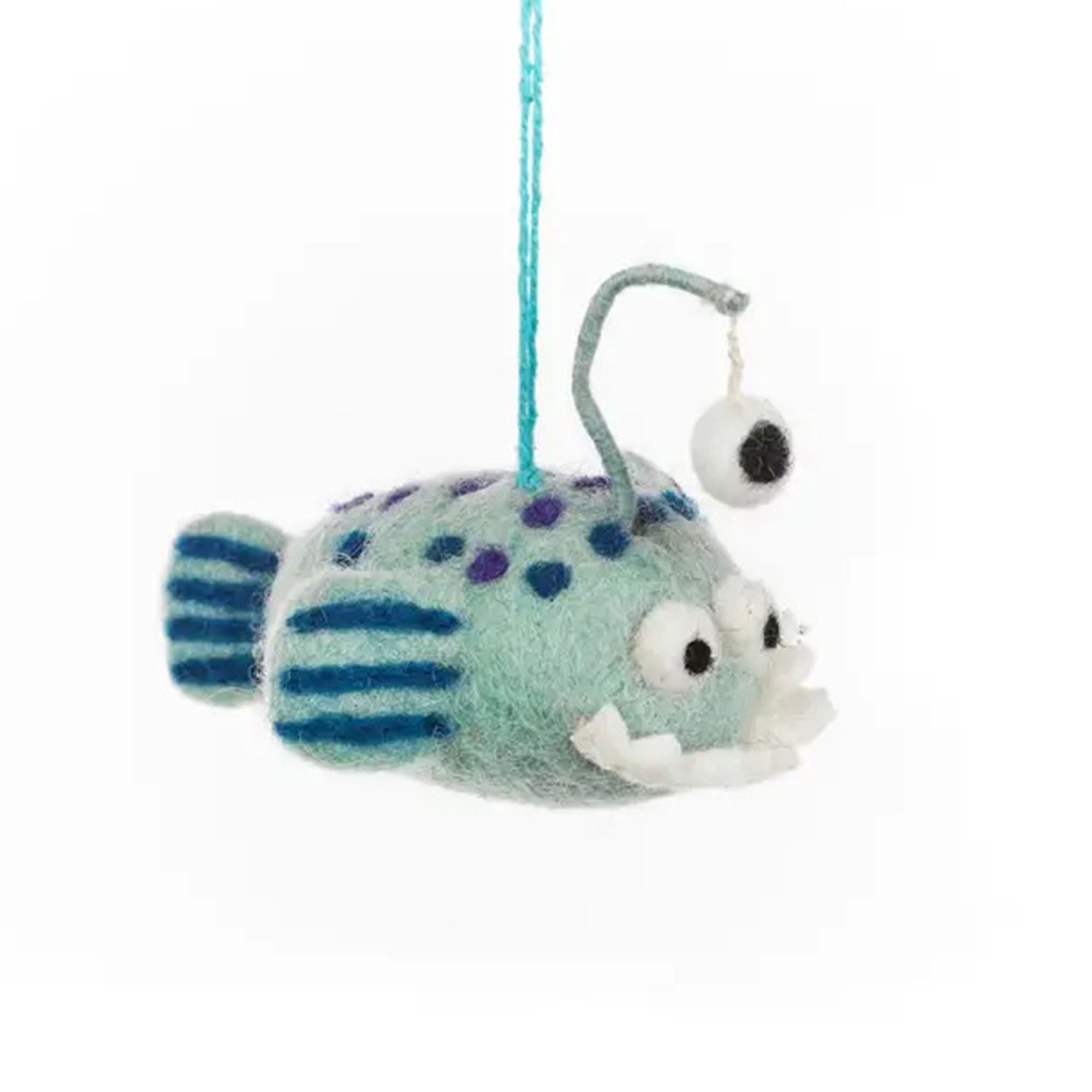 Hanging felt fish ornament with blue stripes and purple spots on a white background