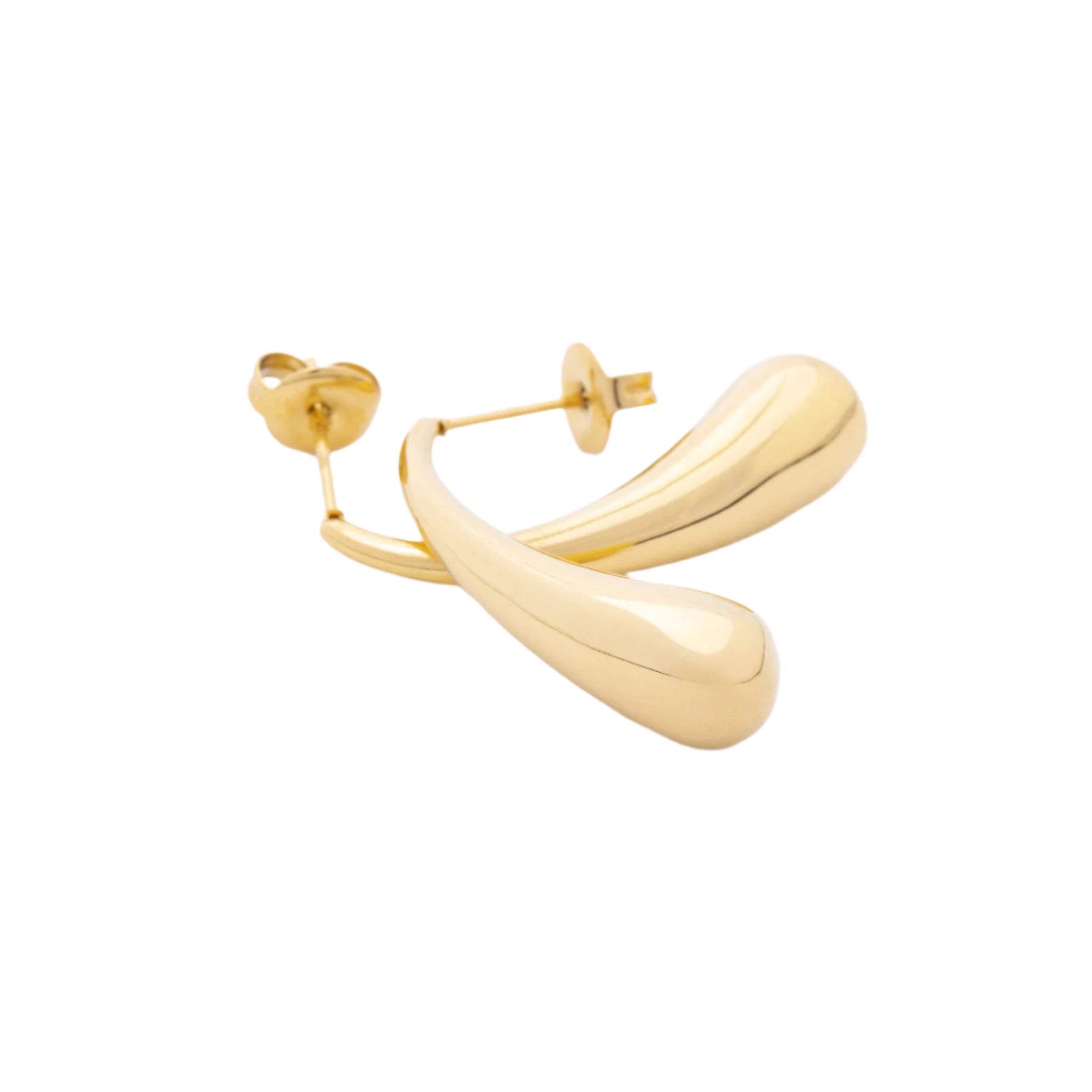 Elegant Water Drop earrings resting on a fabric surface, showcasing their minimalist teardrop shape and ethical craftsmanship.