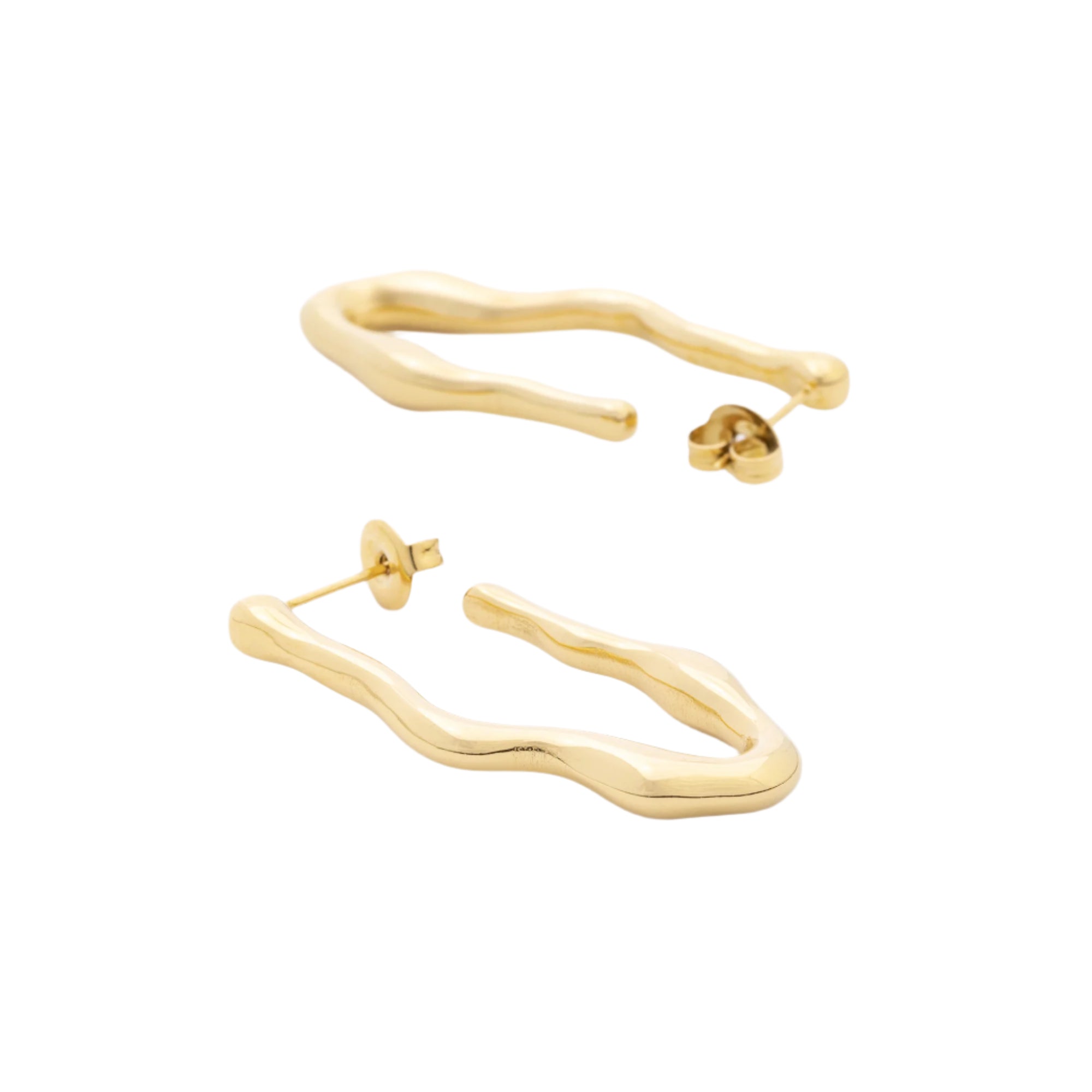 Water Fall earrings crafted from recycled 14K gold and stainless steel, shown resting on a soft surface. Their shimmering, elongated shape reflects timeless eco-luxury.