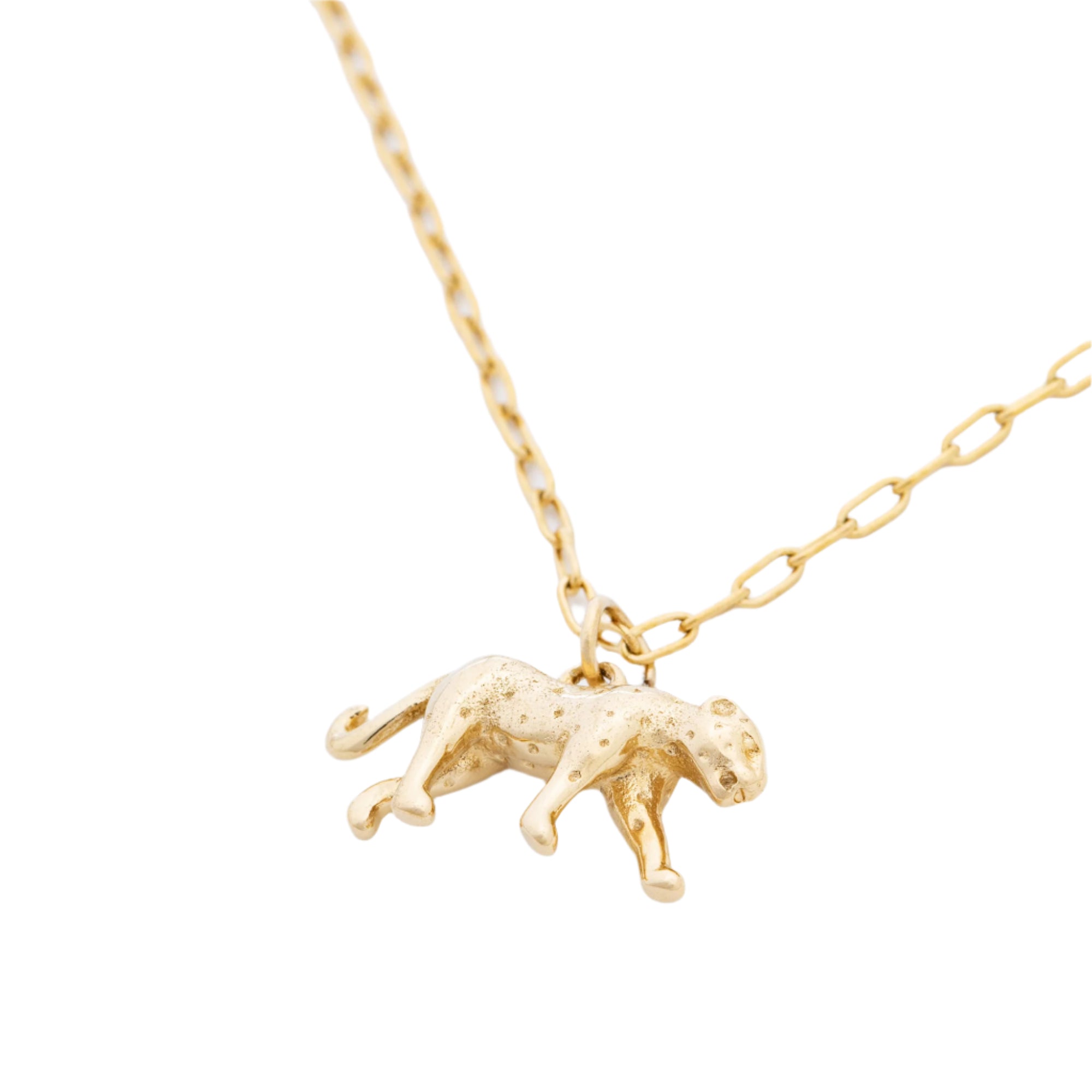 Intricate details of the Big Cats necklace pendant, showcasing the fine artistry of recycled 14K gold plating.