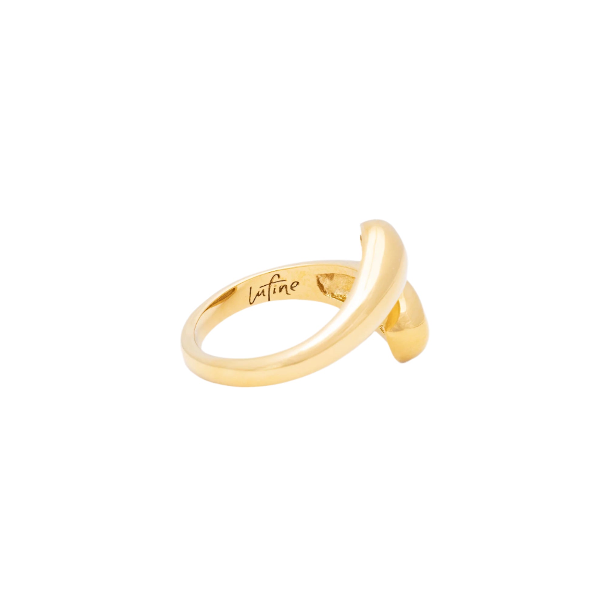 A detailed image of the Water Drops gold ring, capturing its smooth, curved lines and radiant recycled 14K gold plating on a white surface.