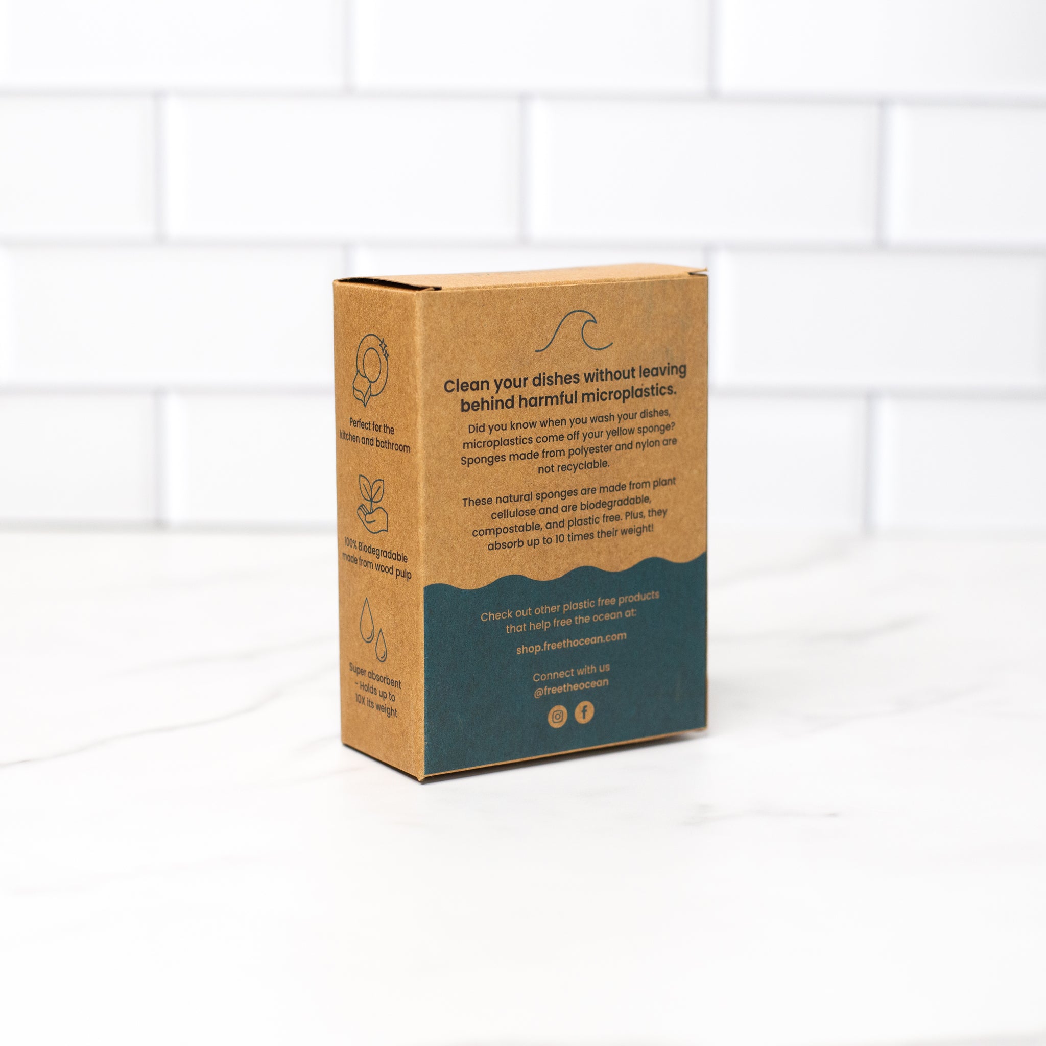 Close-up of the back side of the biodegradable kitchen sponges Kraft box, highlighting detailed usage and composting instructions.