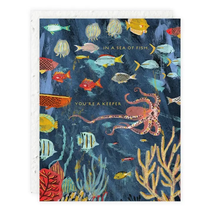 Seedling card showing an underwater scene with fish and an octopus, "In a sea of fish, you're a keeper" text, with a plantable seed paper envelope.
