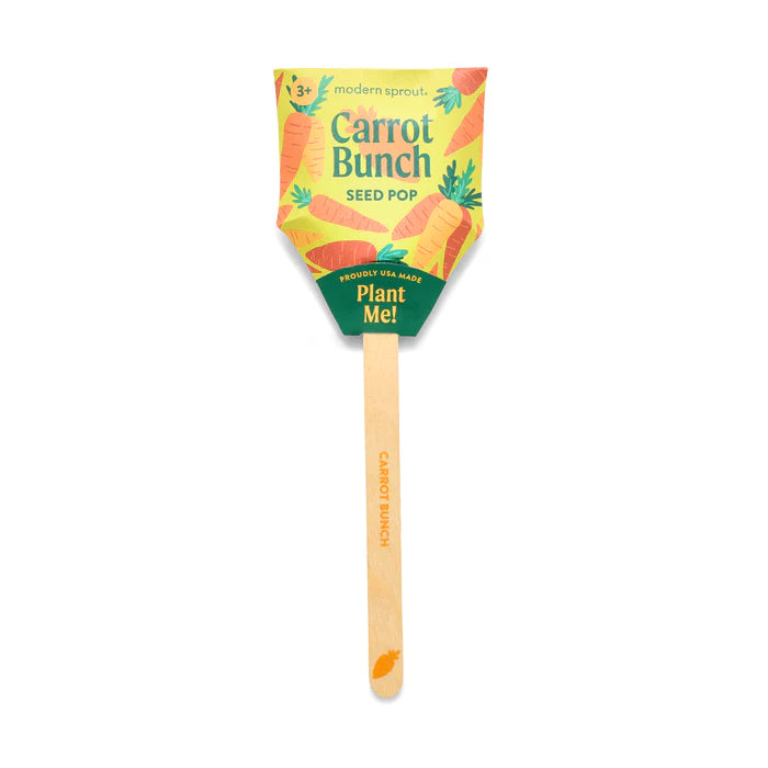 A single "Carrot Bunch" seed pop on a bamboo stick. The colorful package features carrot illustrations and the playful phrase "Plant Me!", making it a cute and fun way to grow a treat.