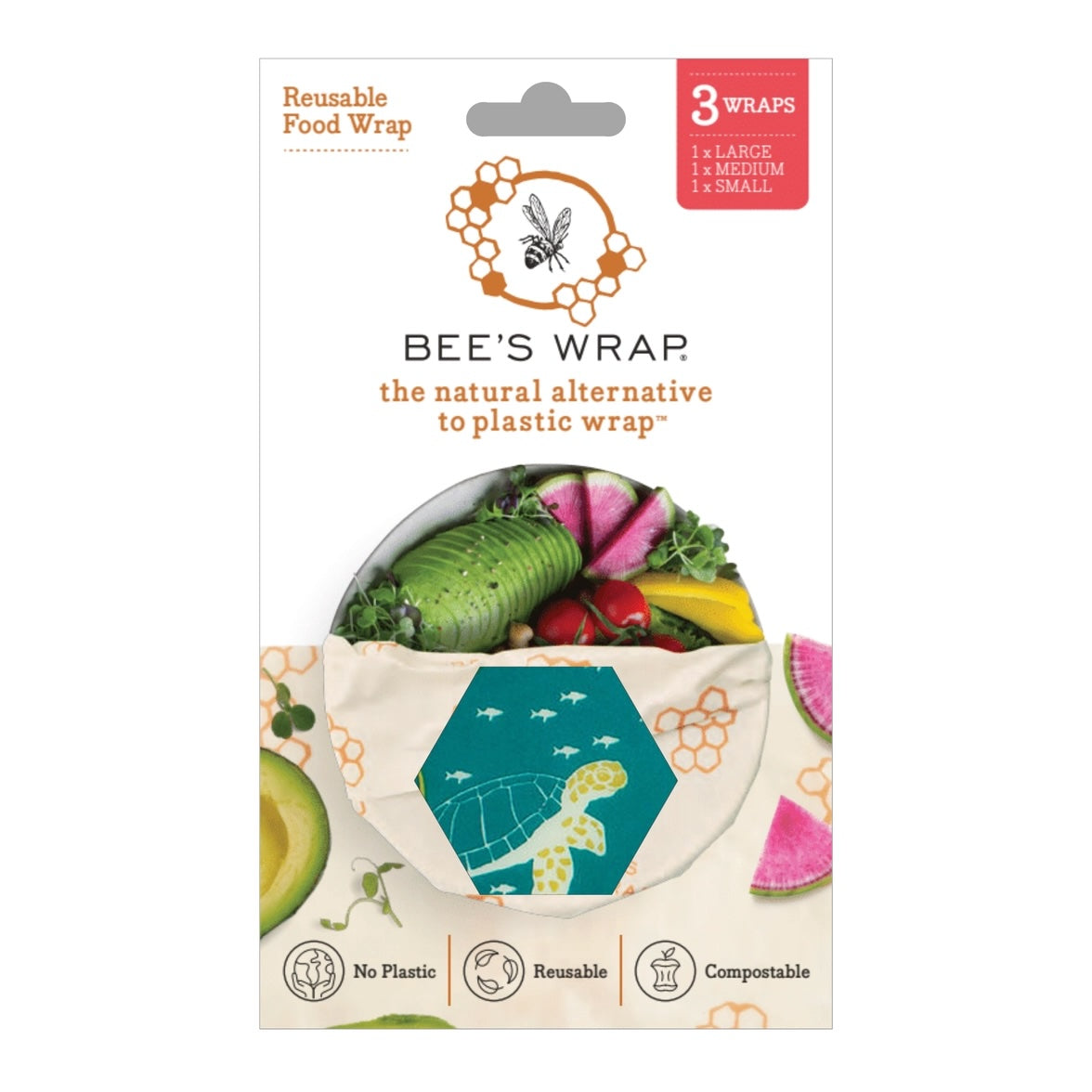Packaging for Bee’s Wrap reusable food wraps showing a hexagonal window with an ocean-themed pattern and fresh vegetables inside the wrap.