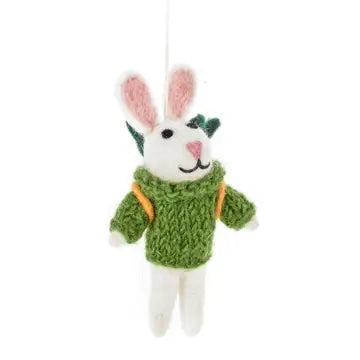 A handmade felt rabbit ornament wearing a green knit sweater and a green leaf on its head is shown.