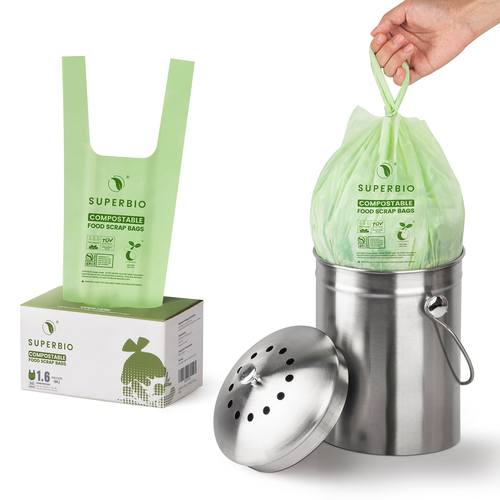 A box of Superbio compostable food scrap bags and a metal compost bin. One light green bag is pulled from the box on the left while a person holds a filled bag over the opened bin on the right.