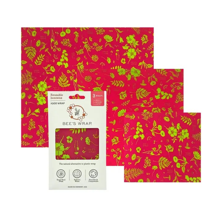 Bee’s Wrap reusable food wrap set in red with green and yellow floral pattern, includes three sizes: small, medium, and large.