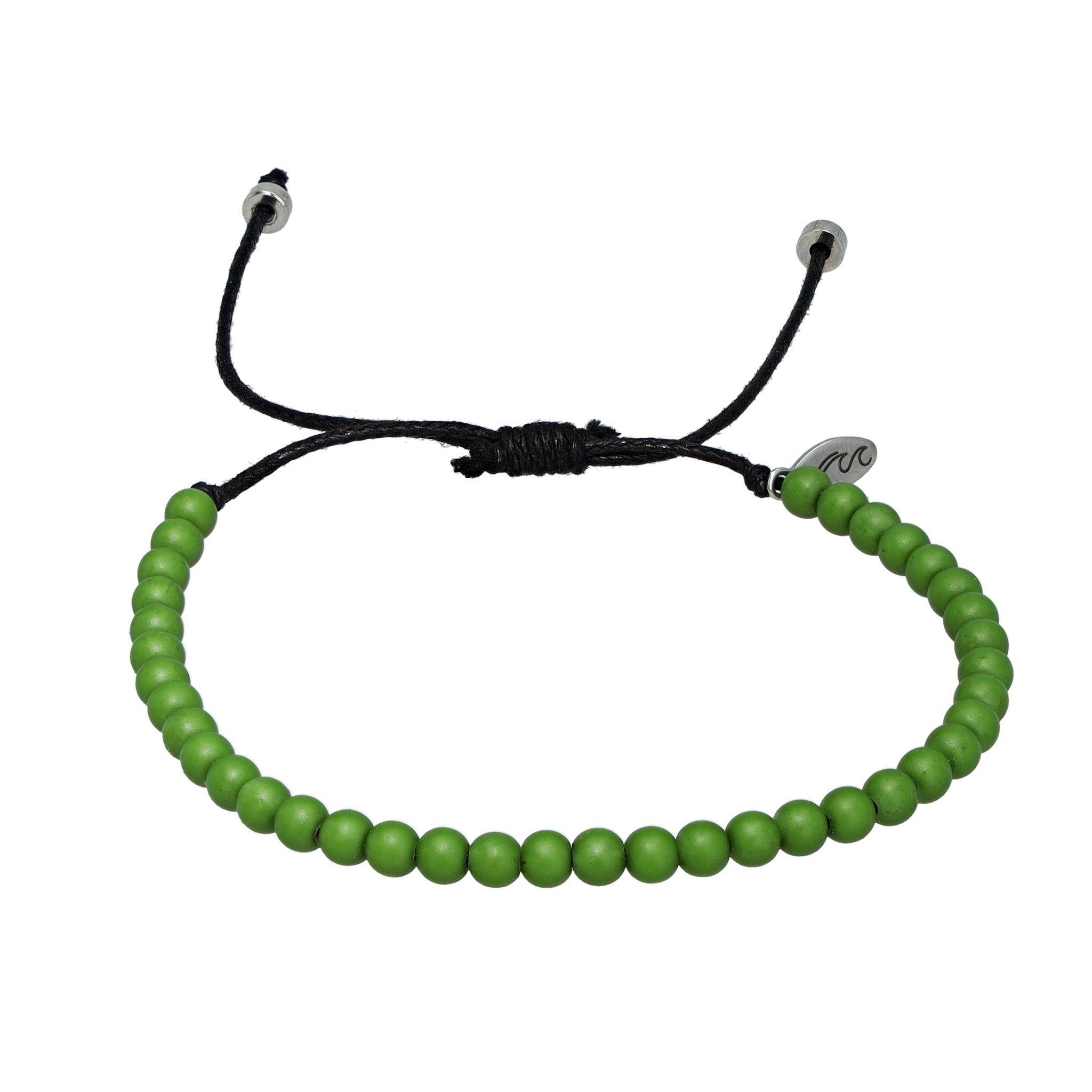 Olive green bracelet made from recycled ocean plastic, featuring a stainless steel charm and adjustable cotton cord. Handmade in Bali, water-safe, and eco-friendly.