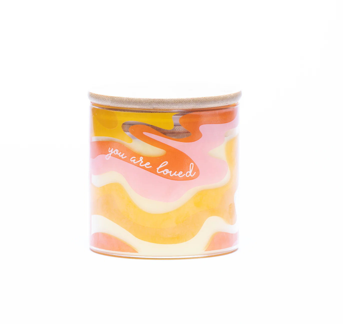 “You Are Loved” soy wax candle. Handcrafted with clean-burning essential oils and vegan, sustainable ingredients.