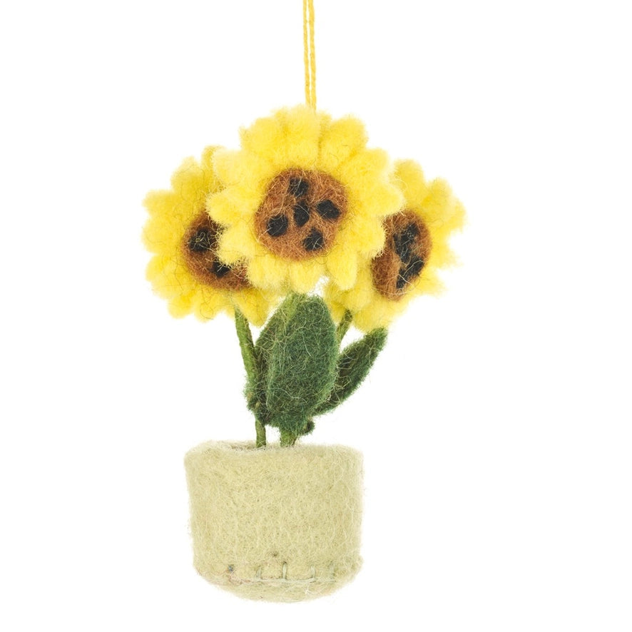A handmade felt hanging decoration shows three yellow sunflowers with green stems and leaves in a light green pot.
