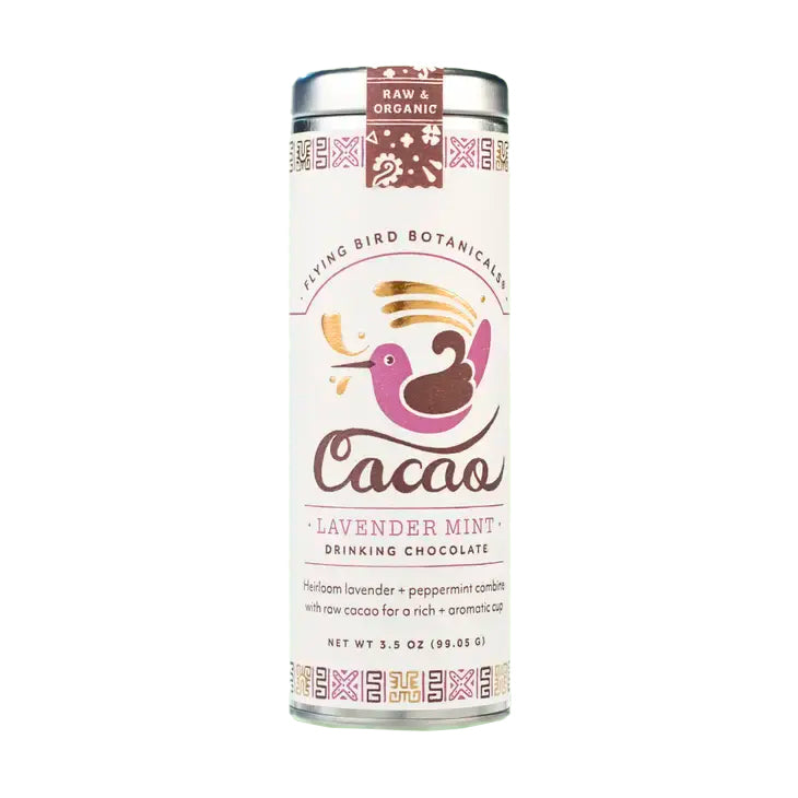 Lavender Mint Cacao tin placed on a neutral surface. Organic, vegan cacao made with raw heirloom chocolate, sweetened with sun-dried cane and infused with lavender and mint.
