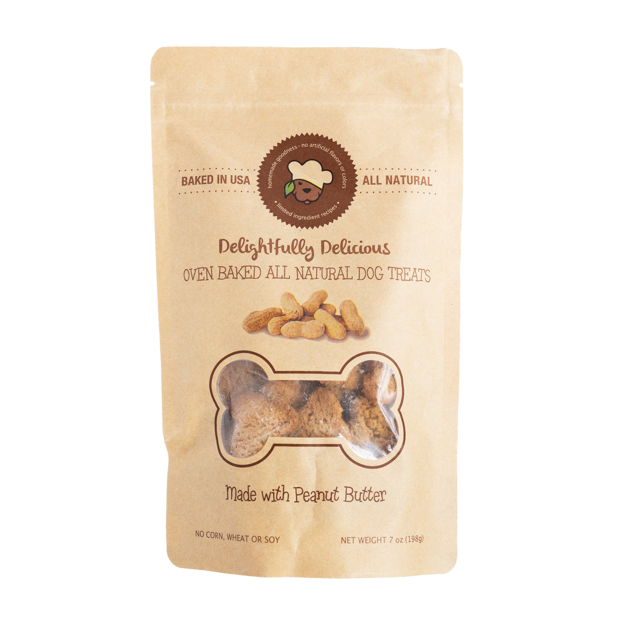 A brown bag of dog treats is shown on a white background. The bag is labeled "Delightfully Delicious Oven Baked All Natural Dog Treats" and "Made with Peanut Butter". The bag has a bone-shaped cutout revealing the treats inside, and it also notes that the treats are "Baked in USA" and contain "no corn, wheat or soy".