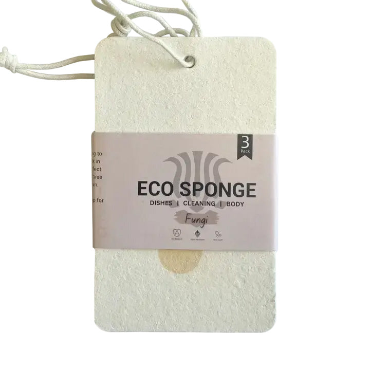 Pack of three compostable eco sponges with the recyclable paper sleeve label facing forward, made from absorbent, plastic-free wood cellulose.