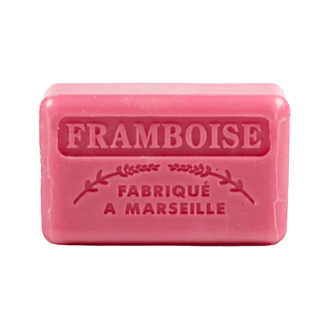 A pink French soap bar with embossed text reading "Framboise" and "Fabriqué a Marseille" on a white background.