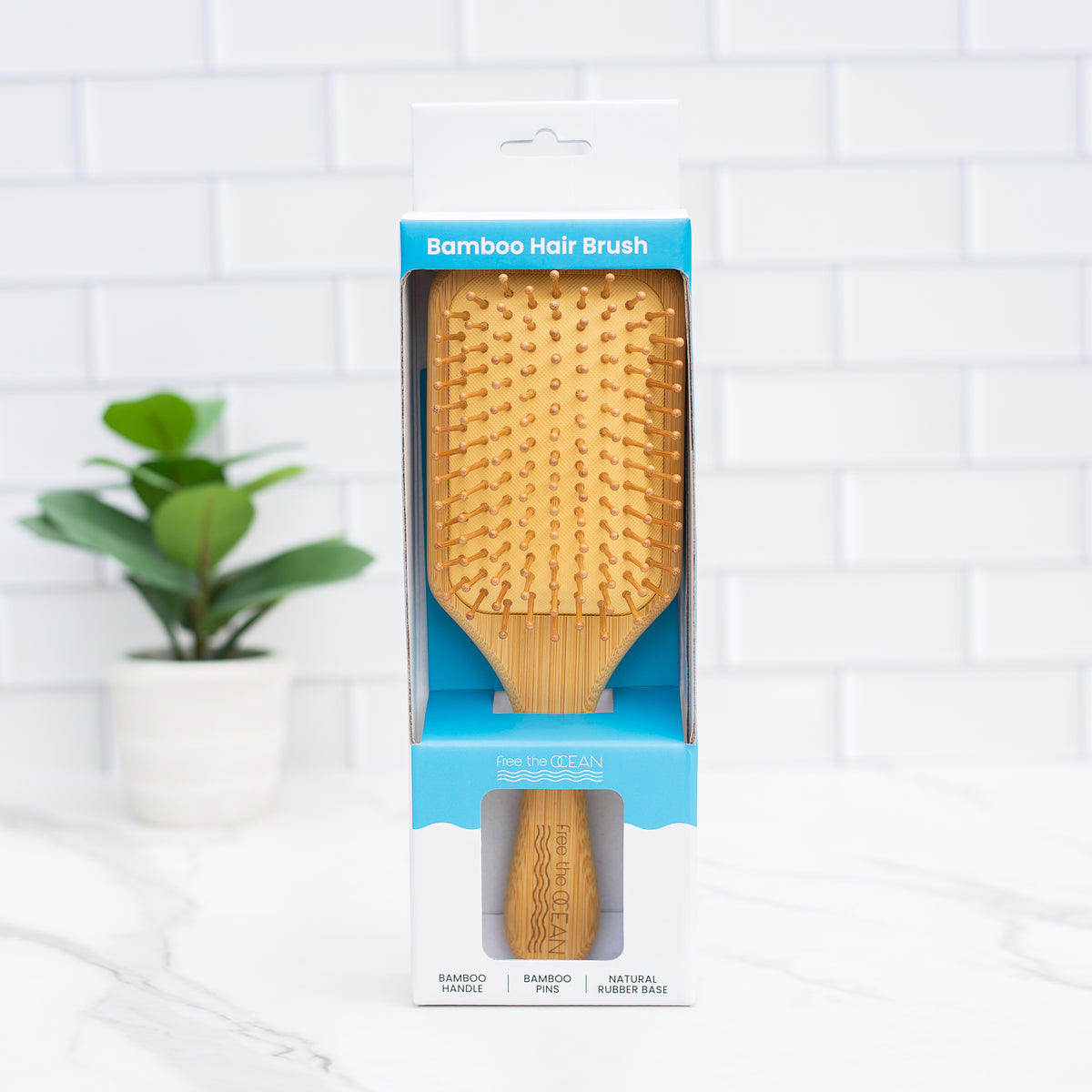 http://shop.freetheocean.com/cdn/shop/files/fto-custom-hair-brush-image-3.jpg?v=1685552843&width=1200