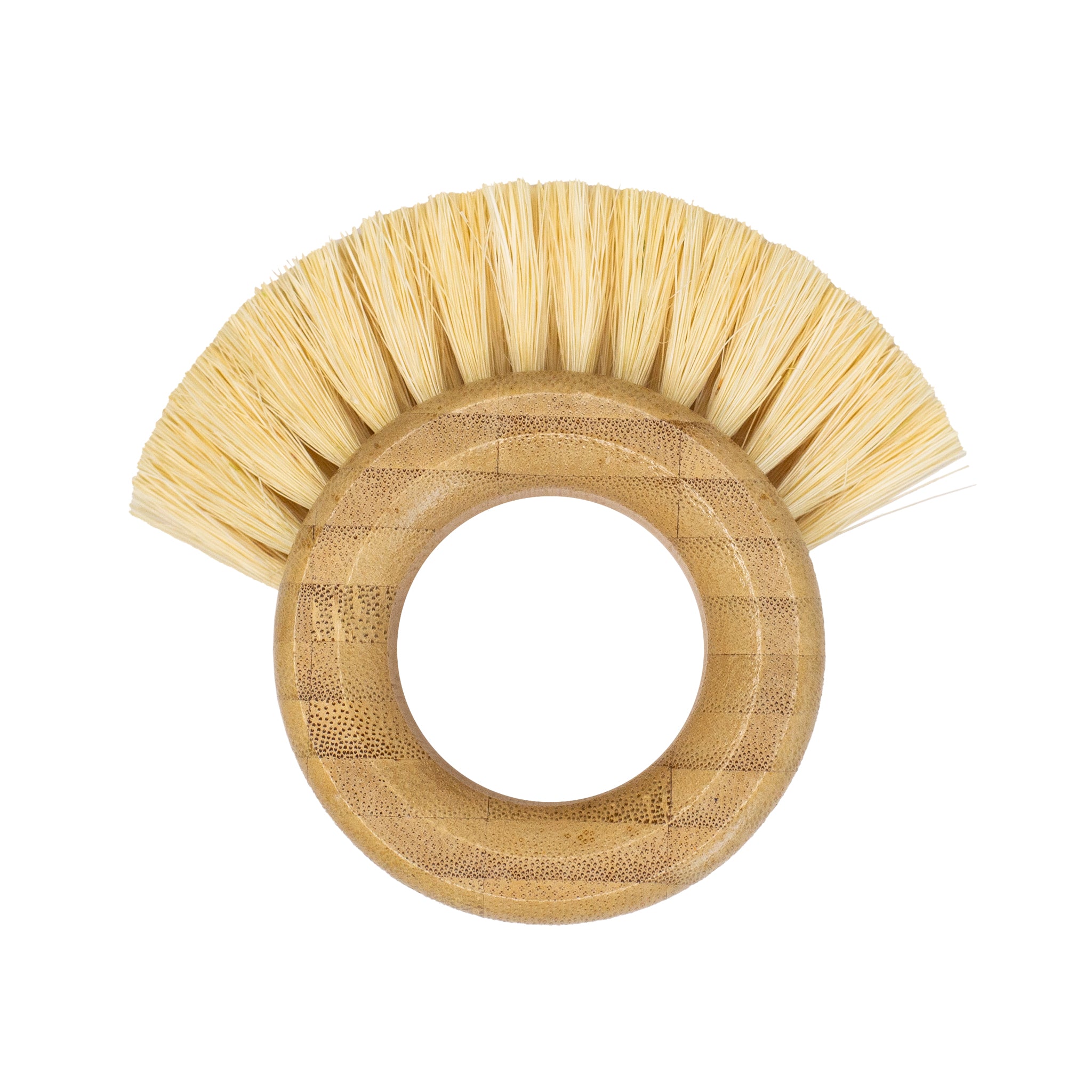 A vegetable brush made of light colored bamboo is shaped like a thick ring. The upper half of the ring is adorned with light blonde bristles that fan out in a semi-circle.