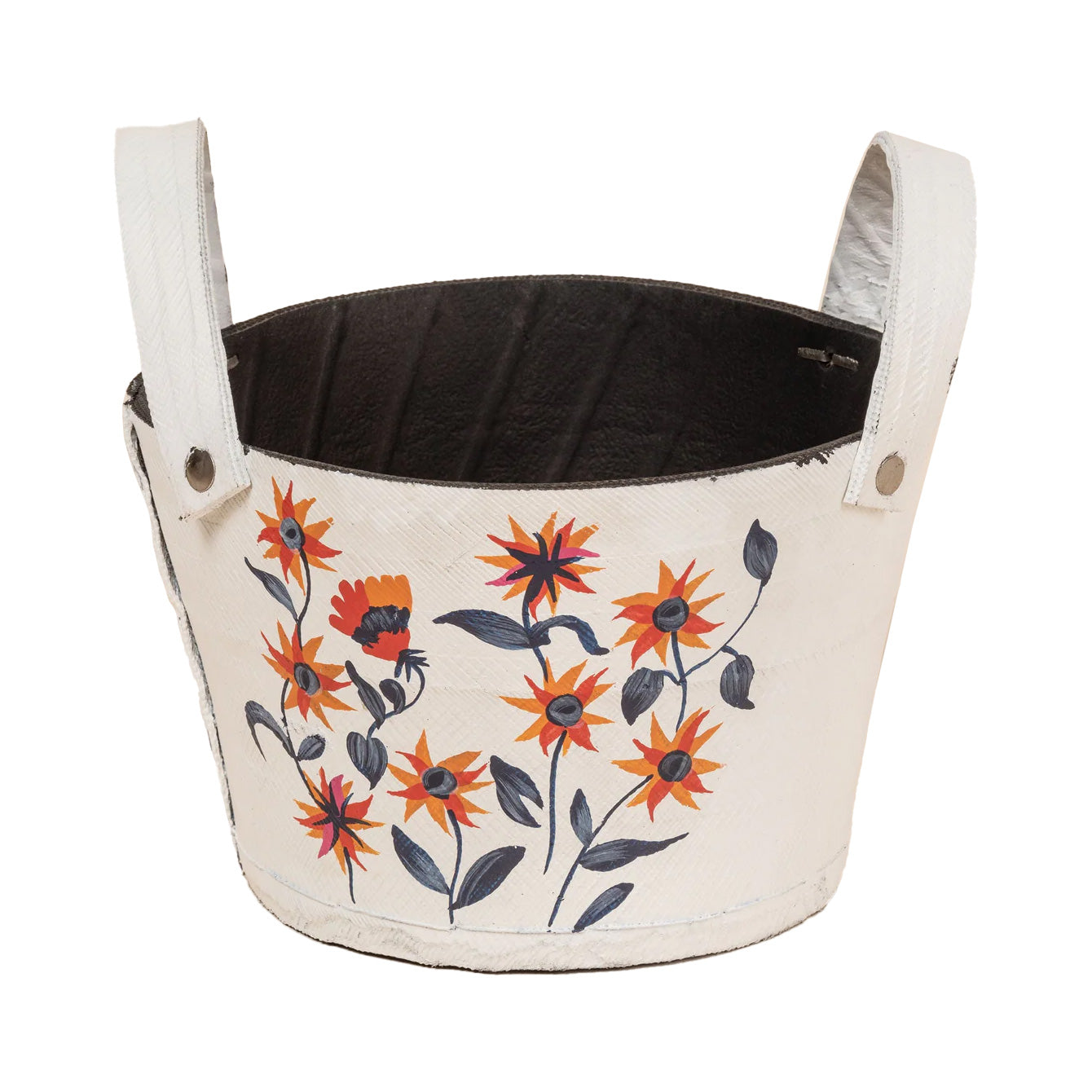 Small white planter made from recycled rubber, hand-painted with orange flowers and green leaves. Black interior visible with curved handles on both sides.