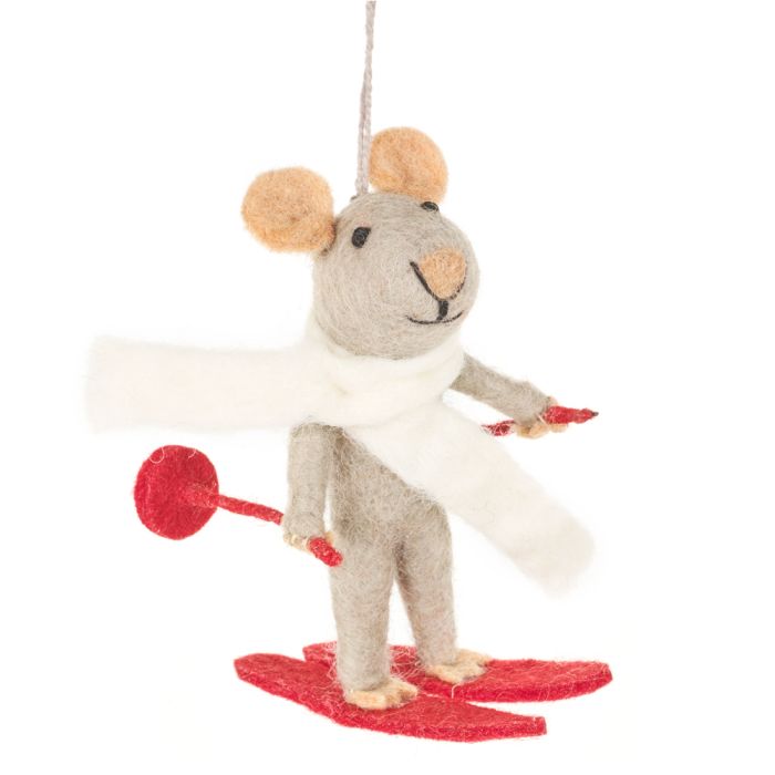 A handmade felt mouse on red skis is shown, wearing a white scarf and holding ski poles.