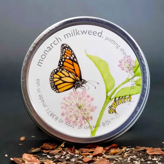 A tin of garden sprinkles with the text  and "monarch butterfly".