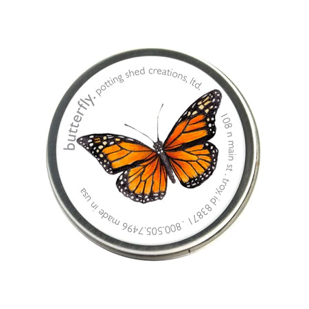 A cute tin of garden sprinkles with a monarch butterfly illustration on the lid. Text on the lid says "butterfly".
