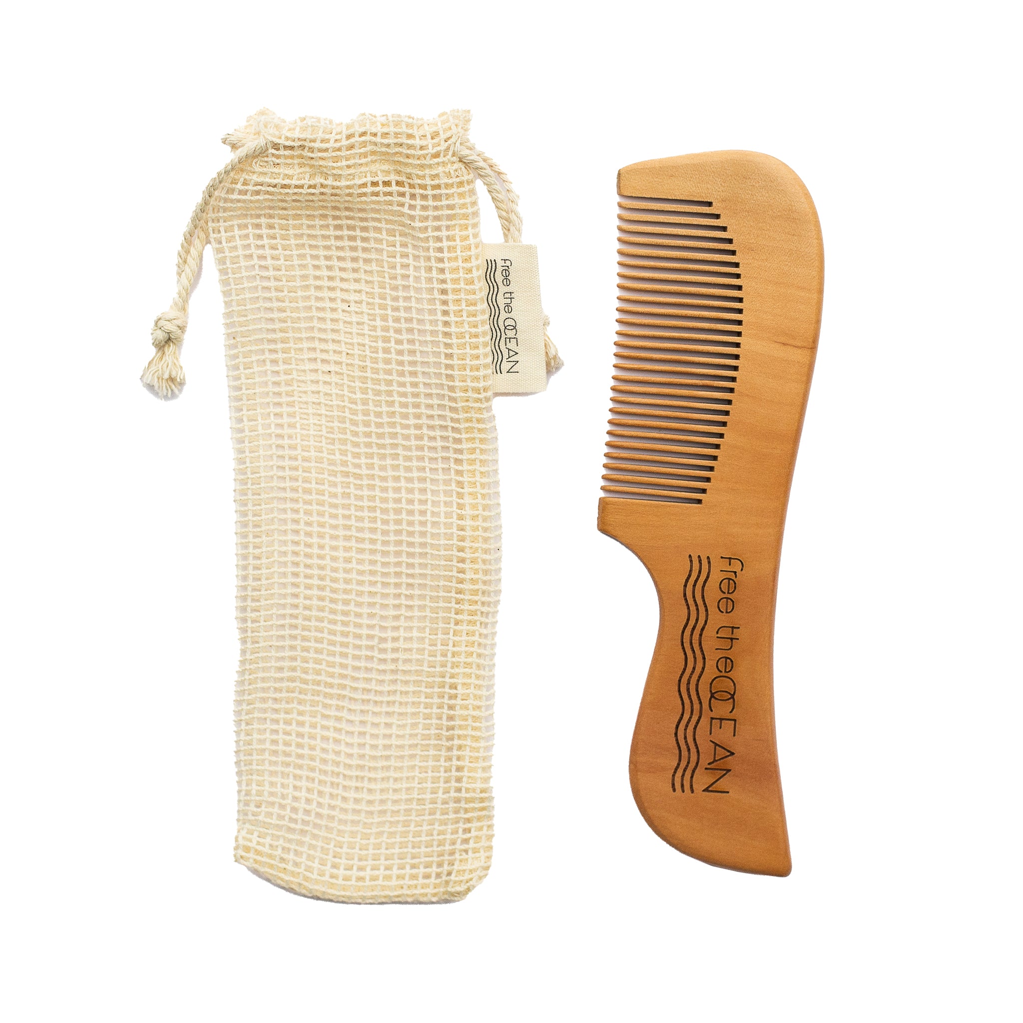 A bamboo comb with a "Free the OCEAN" logo next to its mesh carrying bag with a tag on a white background.