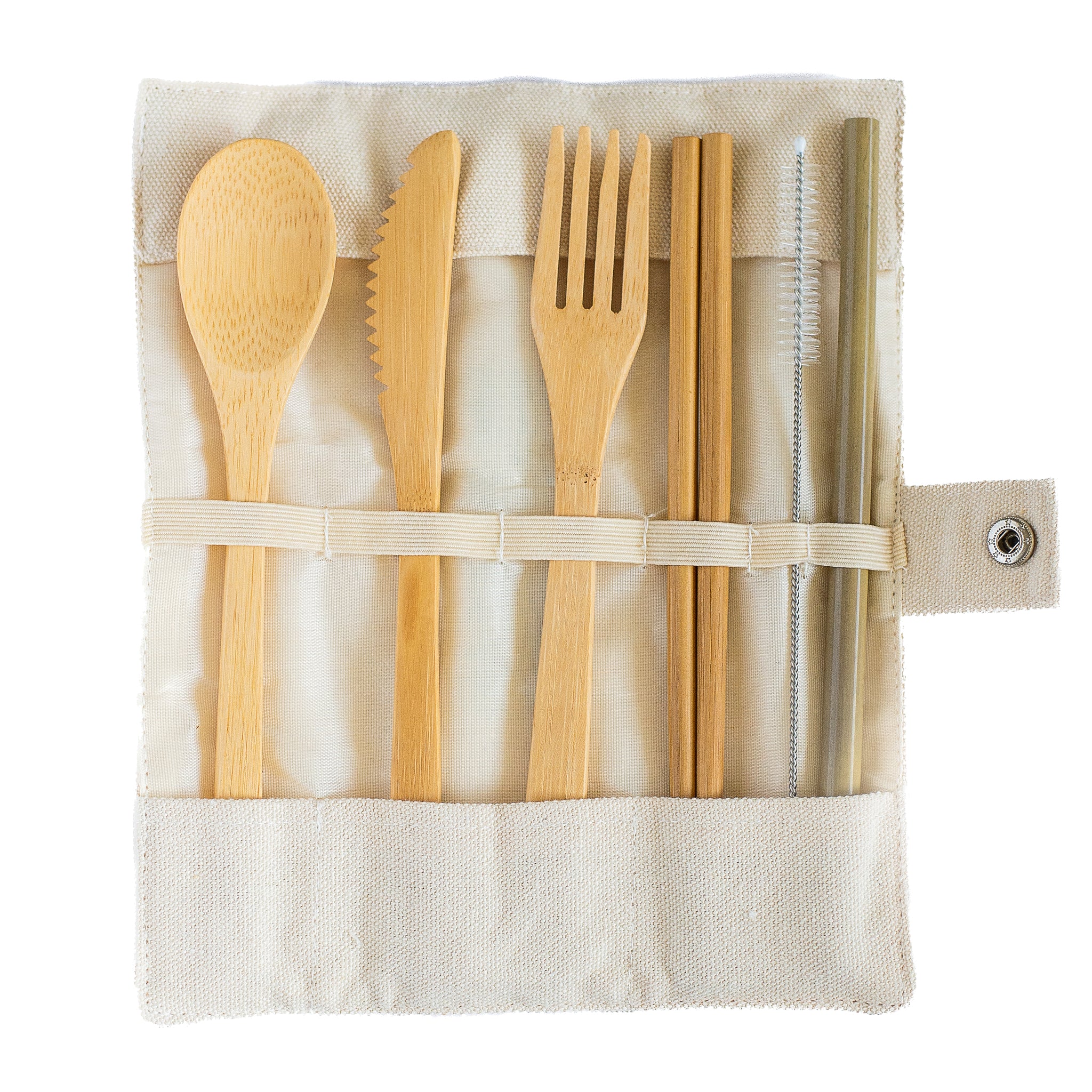 A set of bamboo utensils is shown laid out in a beige fabric roll. The set includes a spoon, a serrated knife, a fork, chopsticks, a straw and a cleaning brush. The roll is secured with a button and loop closure.