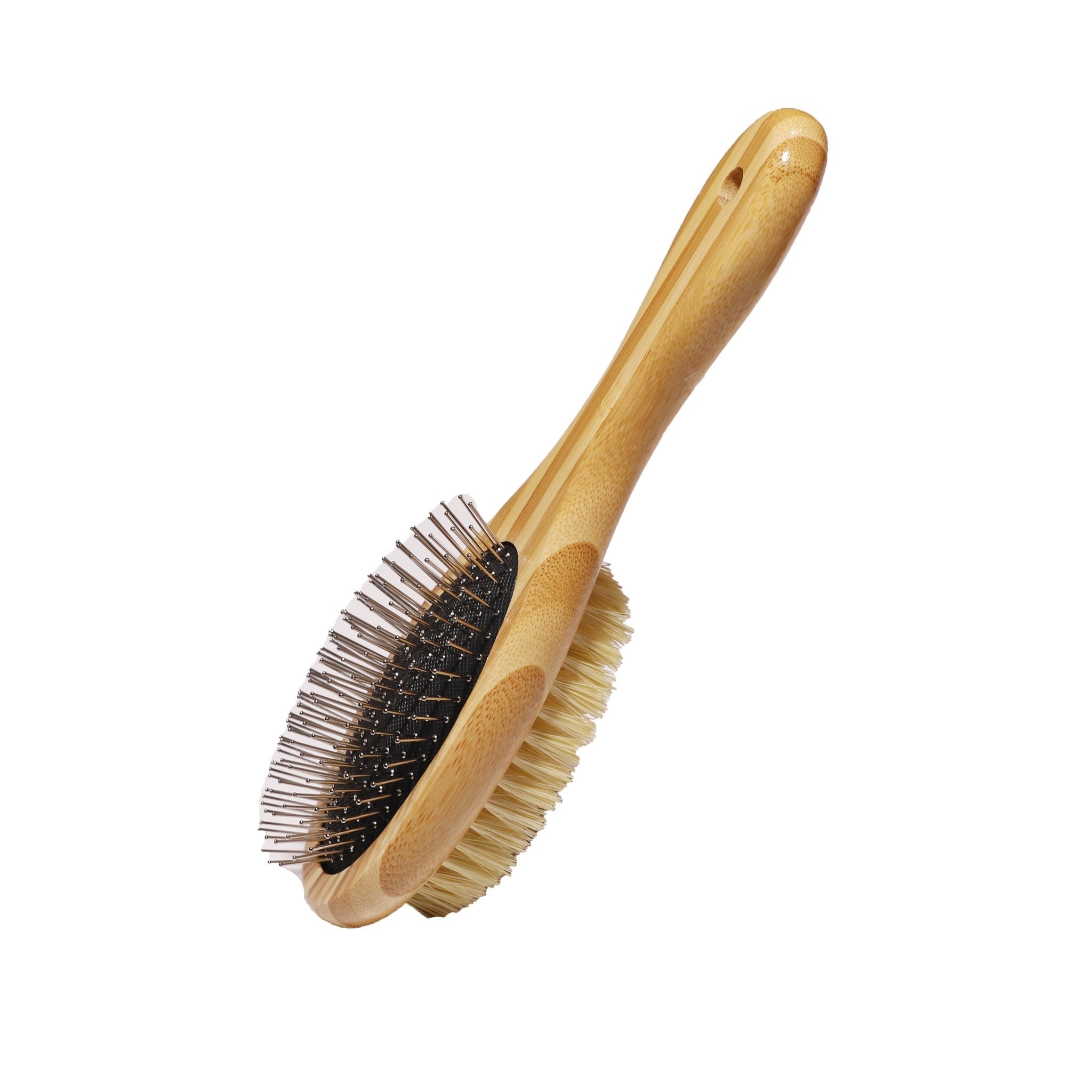 A sustainable bamboo Dog Brush. One side is a bristle brush, and the other is a pin brush for detangling and smoothing hair.