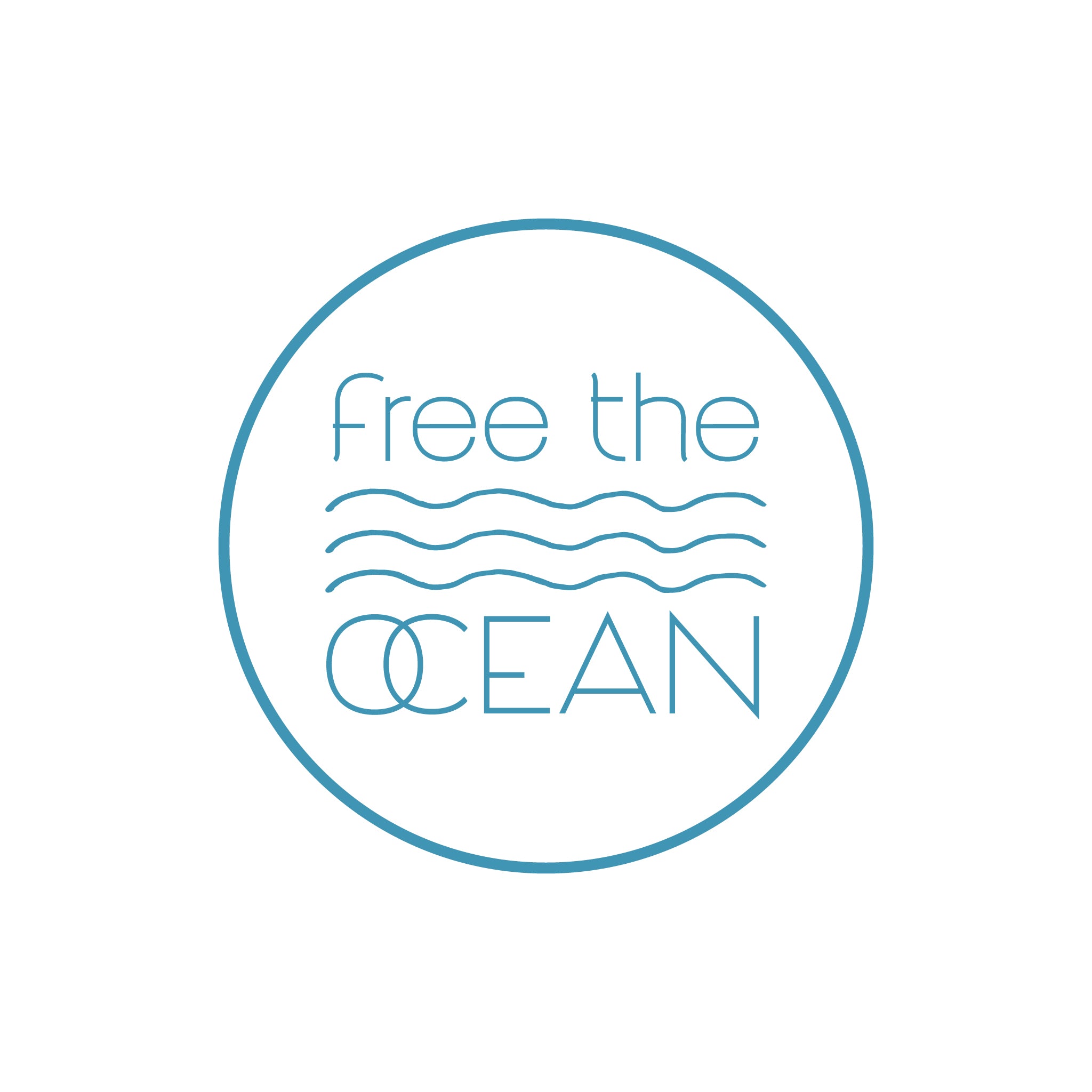 A blue circular logo with the text "free the" above three wavy lines and the word "ocean" below them.