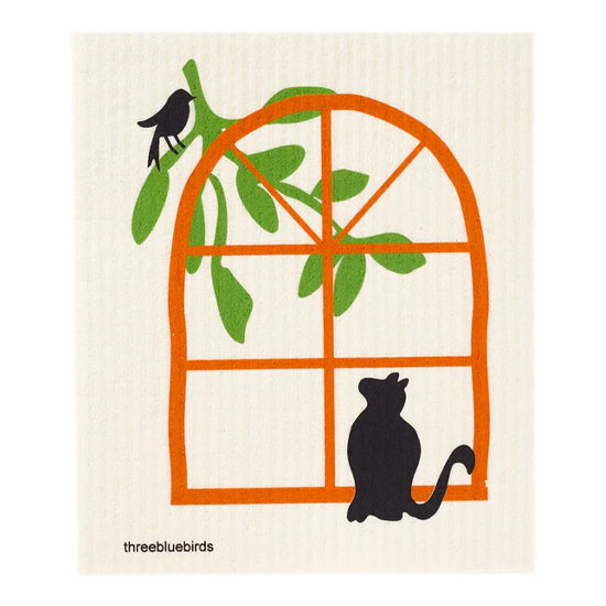 Heartwarming Swedish dishcloth depicting a grey cat looking out through a brown framed window