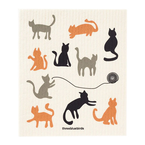 This reusable and compostable Swedish dishcloth showcases an array of various colored cats, including black, grey, and orange. A biodegradable addition to your cleaning supplies