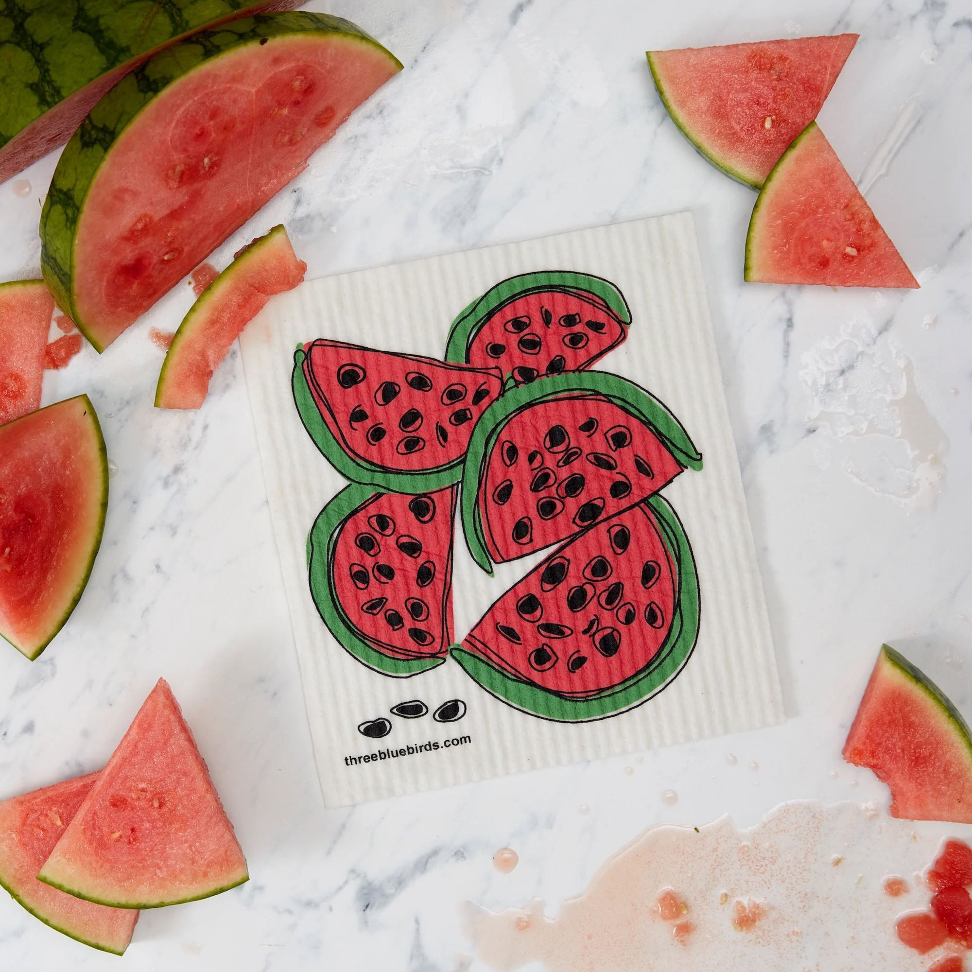 Colorful illustration of watermelon slices featuring reusable Swedish dishcloths, surrounded by fresh watermelon pieces on a marble surface.