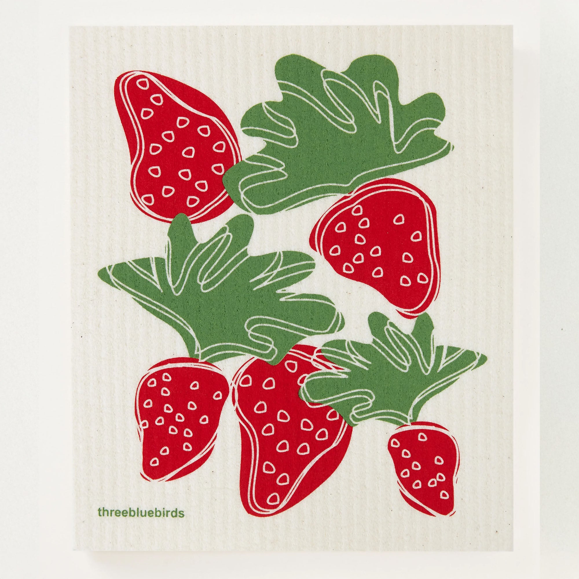 Charming biodegradable reusable cloth patterned with ripe, red strawberries and green leaves.
