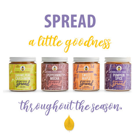 A graphic features a line of four Bumbleberry Farms Honey Cream Spread jars, from left to right: Caramel Pear Cardamom, Peppermint Mocha, Sweet Maple, and Pumpkin Spice. The text "SPREAD a little goodness throughout the season" is also visible, with a single yellow leaf.